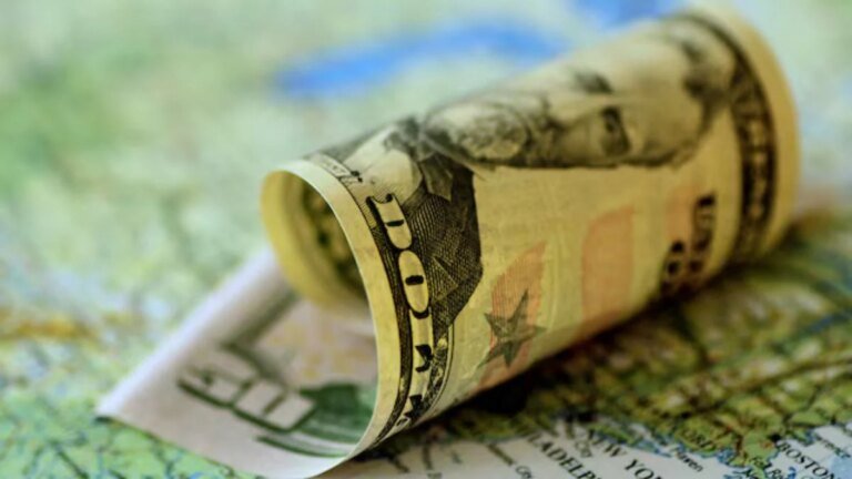Dollar softens as bond market steadies ahead of Fed minutes