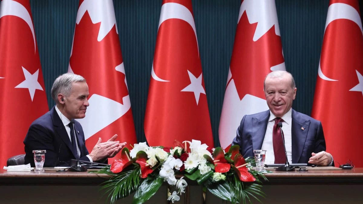 Turkish President Recep Tayyip Erdogan R and Canadian Prime Minister Mark Carney L
