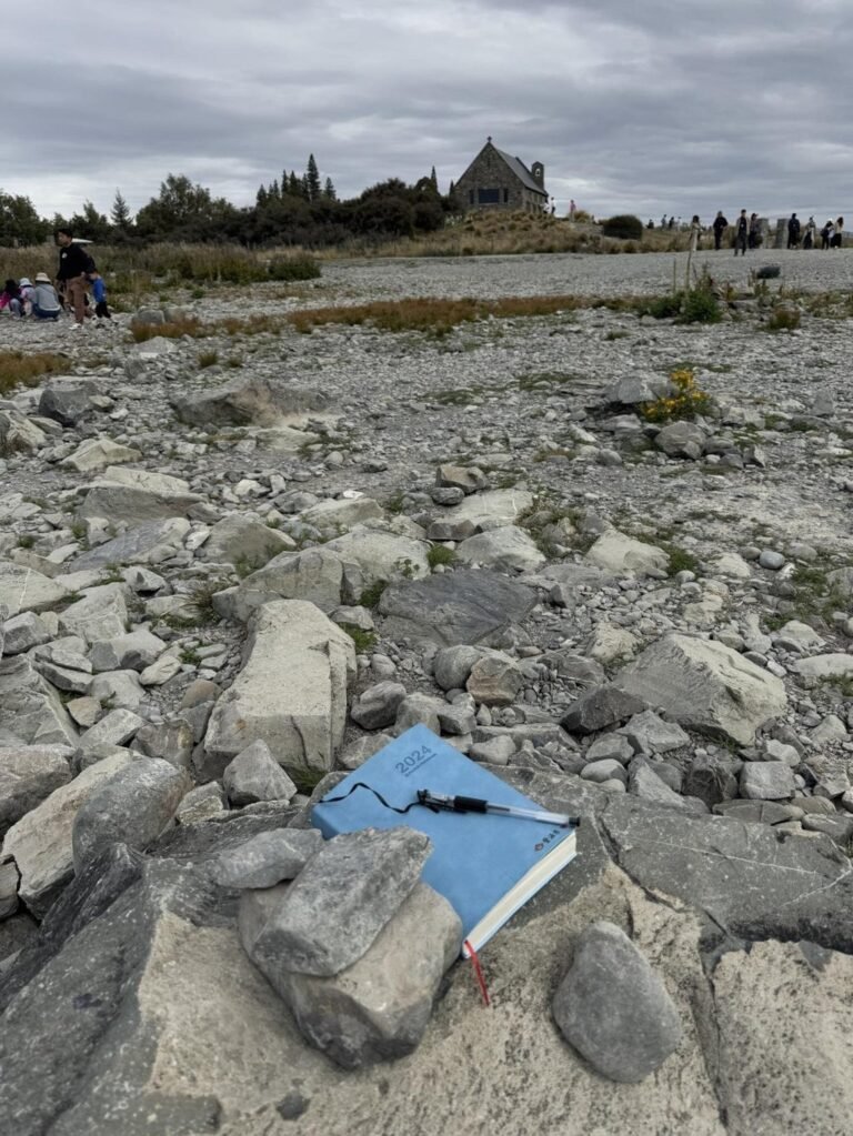 Little Zi Handong’s blue notebook and pen were thoughtfully placed under some rocks for safekeeping. Photo: Handout