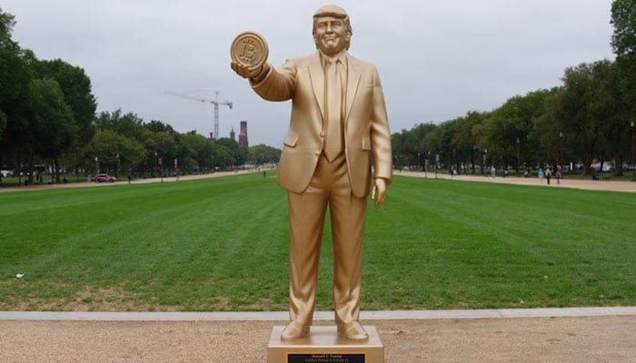 Giant Golden Trump Statue Holding Bitcoin Installed Outside US Capitol