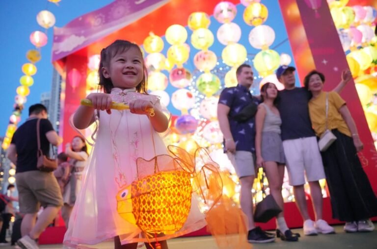 A little girl enjoys the sights in Victoria Park in Causeway Bay. Photo: May Tse