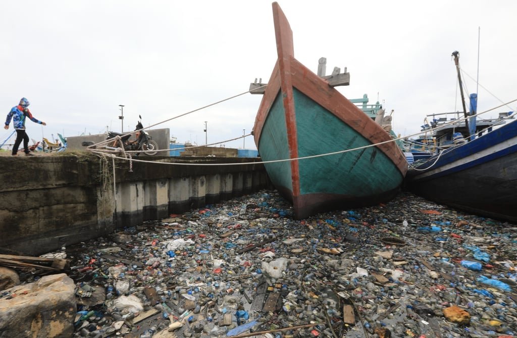 Plastic waste piles up at a port near the coastal area of Banda Aceh on October 22. Photo: EPA