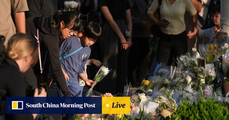 National security police arrest man as Hong Kong mourns 128 fire dead