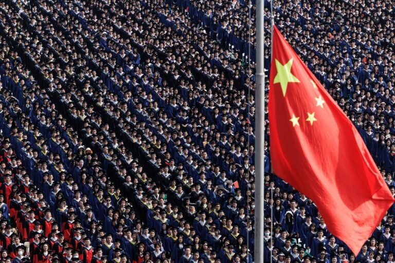 The national flag is raised during a graduation ceremony at China’s Wuhan University in June 2023. Photo: SOPA Images via Zuma Press Wire/dpa