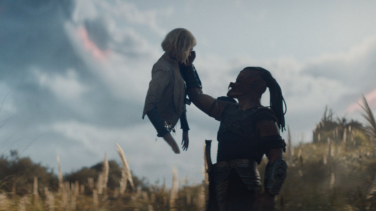 ‘Predator: Badlands’ Star Elle Fanning Explains How Dimitrius Schuster-Koloamatangi Wore Her Like a Backpack