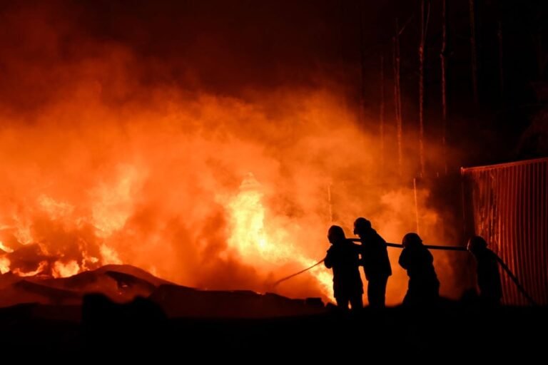 Firefighters work to extinguish a fire after an explosion in an industrial area of Ezeiza, Buenos Aires province, Argentina on Saturday. Photo: AFP