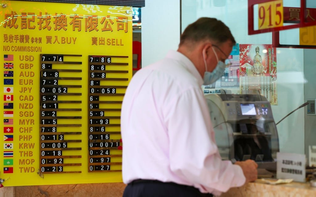 A board shows the exchange rate for various currencies outside a currency exchange shop in Sheung Wan in this file photo from September 2022. Photo: Yik Yeung-man