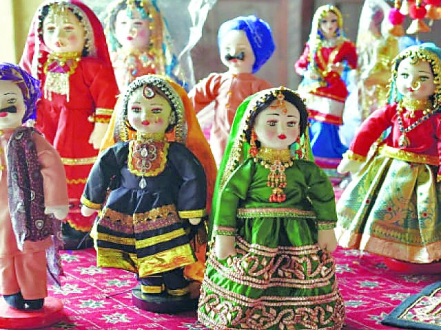 Dolls lost in screen glow | The Express Tribune