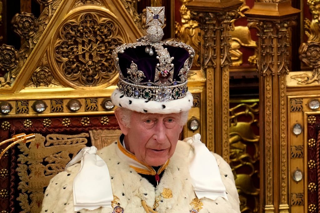 King Charles wears the Crown Jewels during the state opening of parliament in the House of Lords, London, in July 2024. Photo: AP