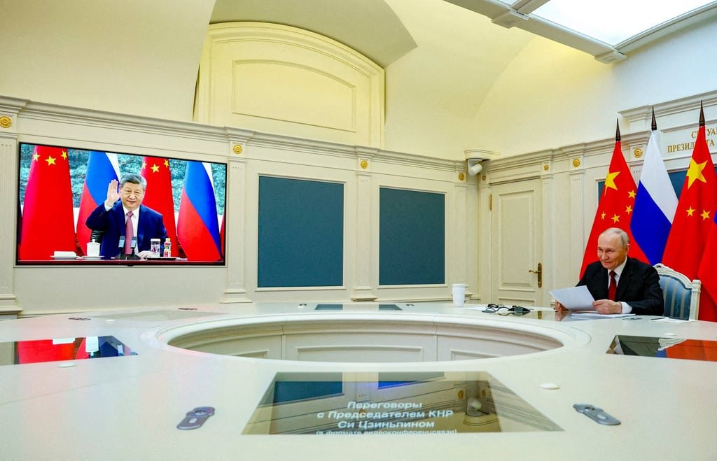 Xi tells Putin a grand plan is needed to develop ties between China and Russia 9 Xi Jinping and Vladimir Putin during the meeting. Photo: via Reuters