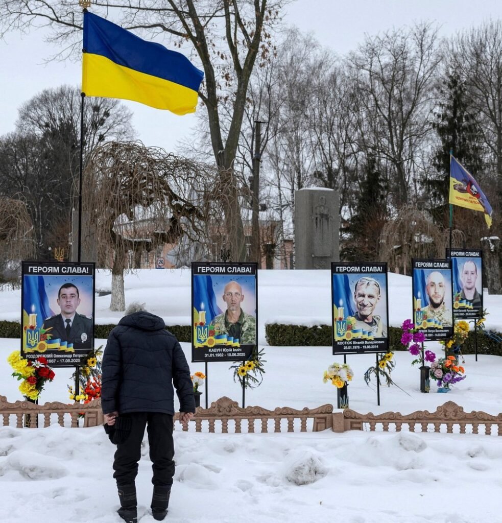 10 arrested over Russian plot to kill top Ukrainian officials 12 A man pays respects to his fallen relative at a memorial site for Ukrainian servicemen who died fighting the invading Russian army in Dzenzelivka on February 4. Photo: Reuters