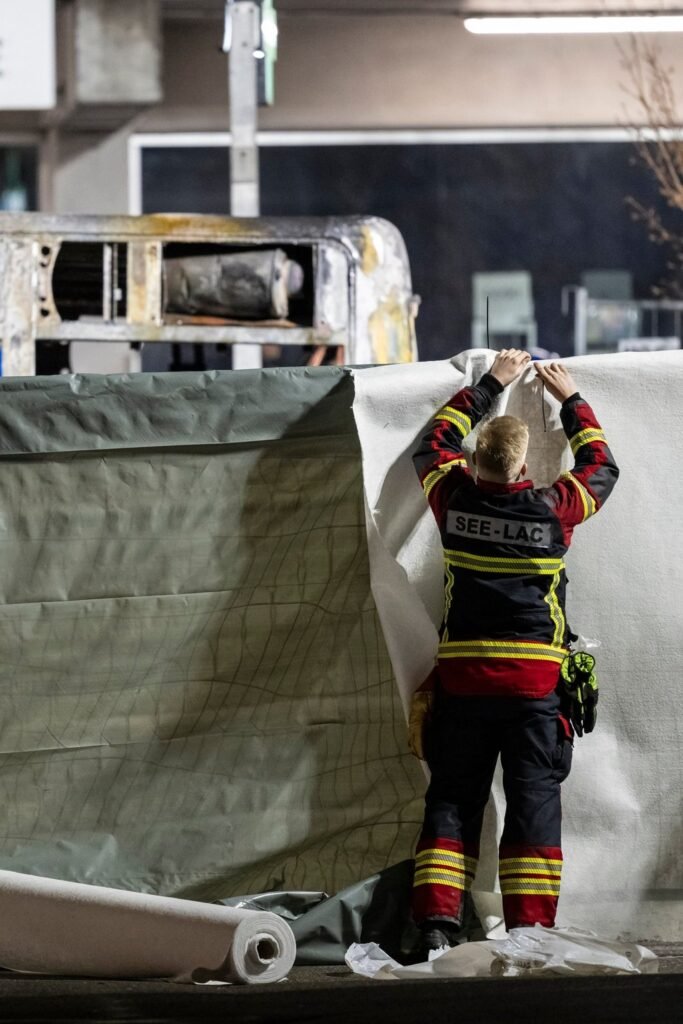 At least 6 killed, 5 injured in Switzerland bus fire 18 Firefighters close off the area in front of a bus after it caught fire in Kerzers, Switzerland, on Tuesday. Photo: EPA
