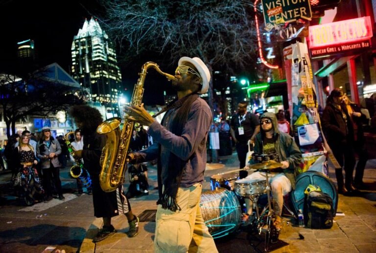 A saxophonist performs on the street during South by Southwest in Austin, Texas, in 2015. Photo: EPA