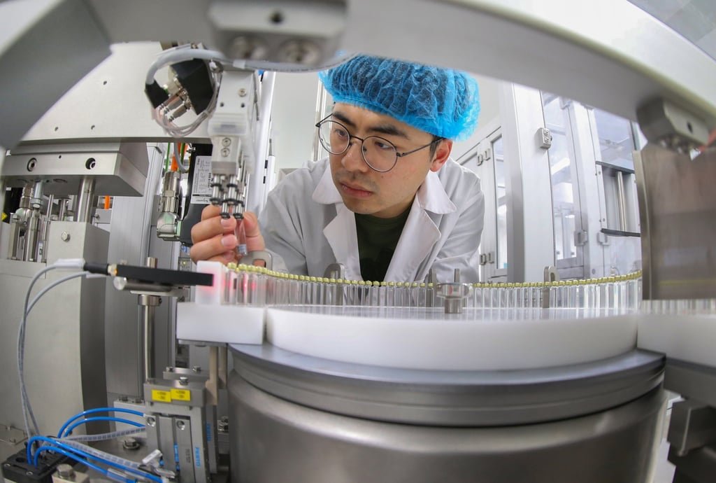 Hong Kong-listed Chinese drug firms set to turn corner on rising sales, deals 12 A worker checks a bottle filling fixture at a preparation workshop of Hengrui Biomedical Industrial Park in Lianyungang, Jiangsu province. Photo: Costfoto/Future Publishing via Getty Images