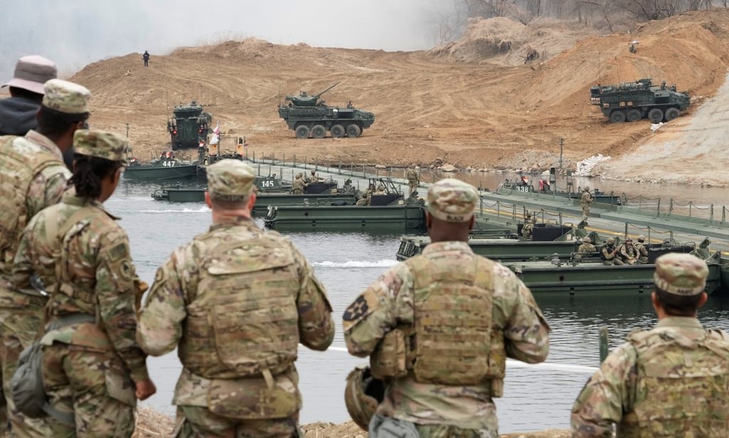 North Korea launches 10 missiles as South Korea, US conduct military exercises 93 US Army’s armoured vehicles move during a joint river-crossing exercise between South Korea and the United States as part of Freedom Shield in Yeoncheon on Saturday. Photo: AP