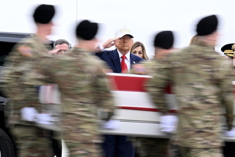 Iran war costing US untold billions, with no end in sight 35 President Donald Trump salutes as a U.S. Army carry team moves a flag-draped transfer case containing the remains of Sgt. Declan J. Coady at Dover Air Force Base on March 07, 2026, in Dover, Delaware. Six soldiers from the 103rd Sustainment Command, including Coady, were killed in action by an Iranian drone strike on March 1 in Port Shuaiba, Kuwait during Operation Epic Fury. (Photo by Roberto Schmidt/Getty Ima