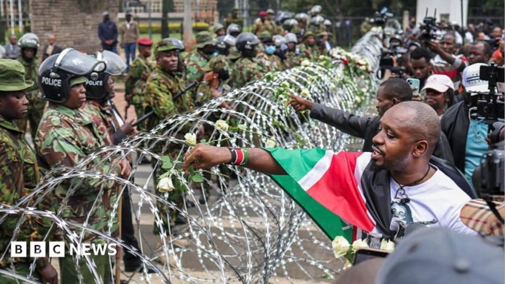 Kenya 25 June protest: Families lay flowers on barbed wire barricade 4 Kenya 25 June protest: Families lay flowers on barbed wire barricade