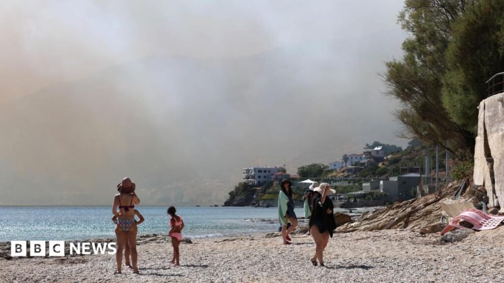 Thousands evacuated in Crete as wildfires threaten tourist resorts 17 Thousands evacuated in Crete as wildfires threaten tourist resorts