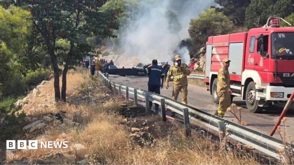 Two crew killed as British pilot survives after firefighting helicopters collide in Greece 22 Two crew killed as British pilot survives after firefighting helicopters collide in Greece