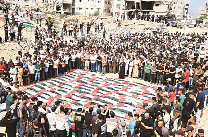 Gaza: 105 Bodies Recovered from Taj Tower Rubble Buried in Mass Funeral 25 gaza taj tower d
